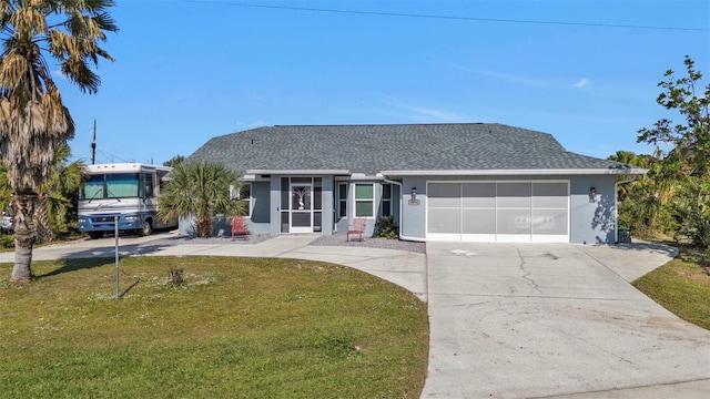 ranch-style house with a garage and a front yard