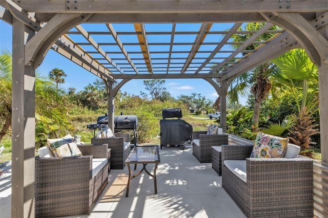 view of patio / terrace featuring a pergola, grilling area, and an outdoor living space