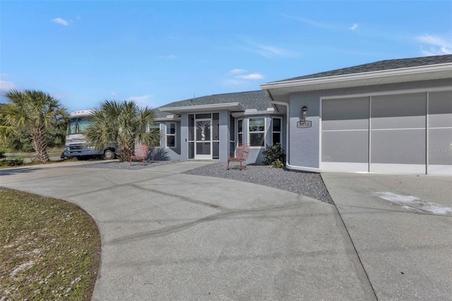 5198 White Ave, Port Charlotte, FL 33981 - single story home with concrete driveway, stucco siding, and an attached garage