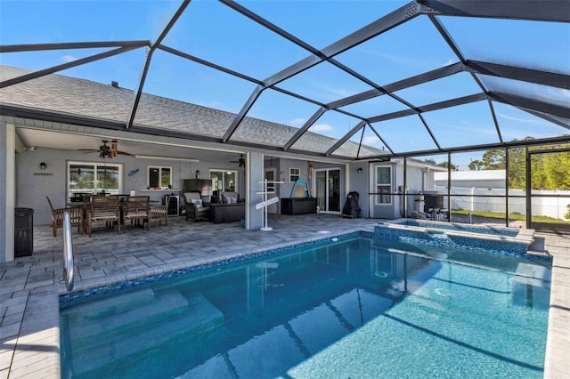 5198 White Ave, Port Charlotte, FL 33981 - view of pool with a ceiling fan, outdoor lounge area, a patio, outdoor dining space, and glass enclosure