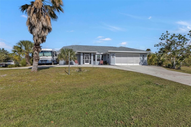 5198 White Ave, Port Charlotte, FL 33981 - view of front of home featuring a garage, a front yard, concrete driveway, and stucco siding