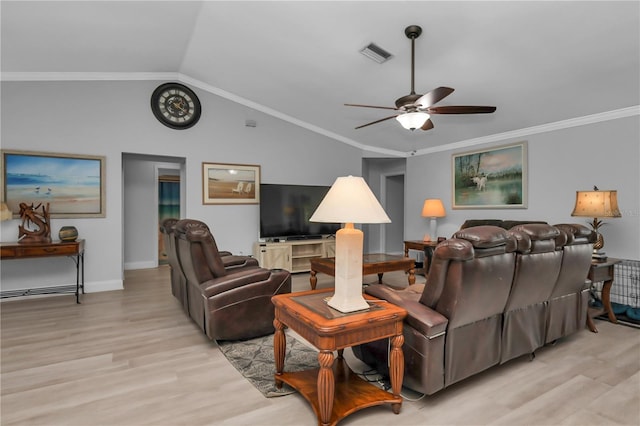 5198 White Ave, Port Charlotte, FL 33981 - living room with ceiling fan, light wood-type flooring, vaulted ceiling, crown molding, and baseboards