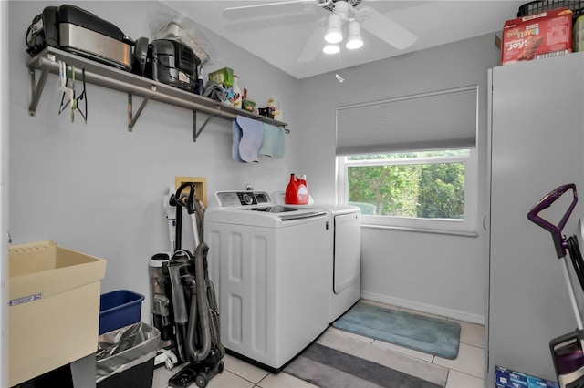 5198 White Ave, Port Charlotte, FL 33981 - laundry area featuring independent washer and dryer, a ceiling fan, and light tile patterned floors