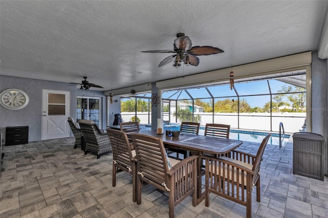 5198 White Ave, Port Charlotte, FL 33981 - sunroom / solarium with ceiling fan, healthy amount of natural light, and outdoor dining area