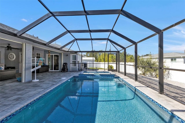 5198 White Ave, Port Charlotte, FL 33981 - view of pool with a ceiling fan, a patio, a fenced backyard, a pool with connected hot tub, and a lanai