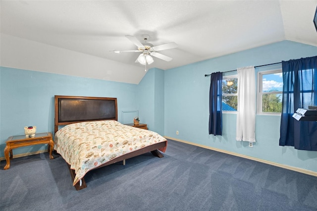 carpeted bedroom featuring ceiling fan and vaulted ceiling