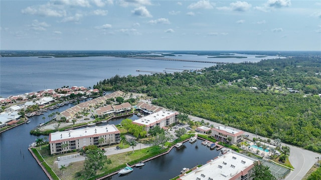 birds eye view of property featuring a water view