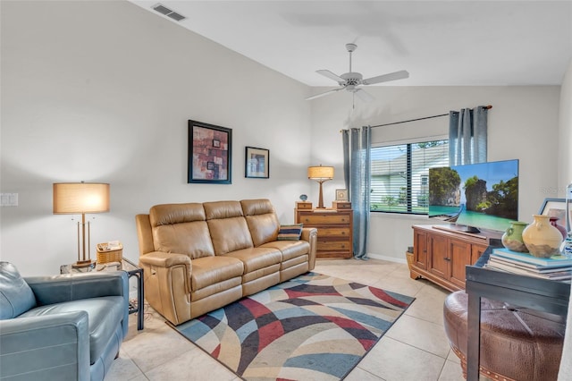 tiled living room featuring vaulted ceiling and ceiling fan