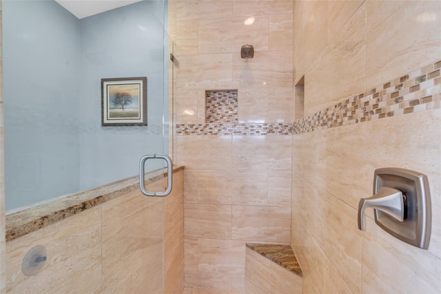 bathroom with an enclosed shower