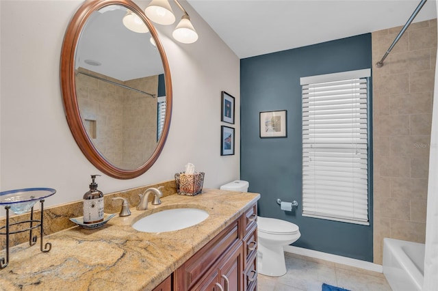 full bathroom featuring tile patterned floors, vanity, toilet, and tiled shower / bath