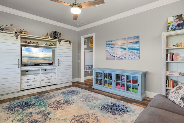 interior space featuring ceiling fan, ornamental molding, and hardwood / wood-style flooring