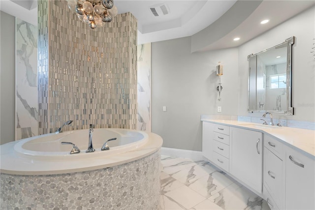 bathroom featuring vanity and a bathing tub