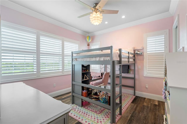 bedroom featuring ceiling fan, dark hardwood / wood-style flooring, and ornamental molding