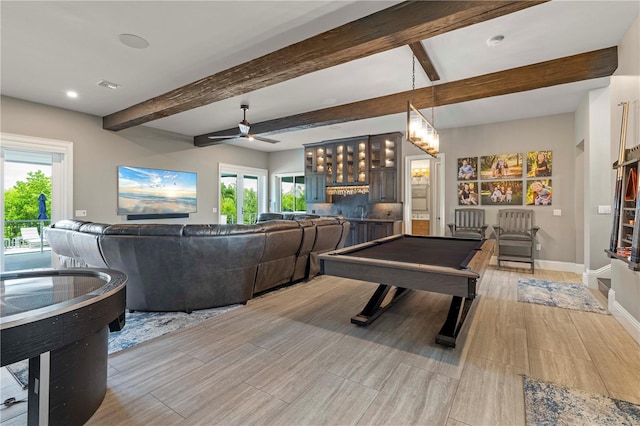 recreation room featuring beam ceiling, a wealth of natural light, ceiling fan, and pool table