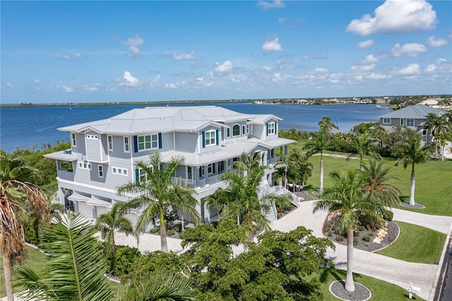 birds eye view of property featuring a water view