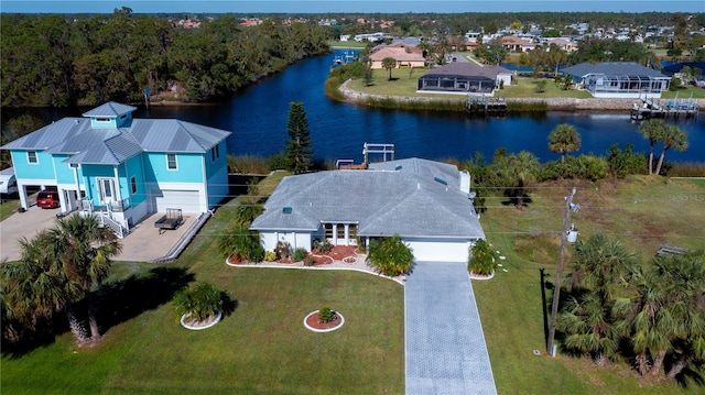 bird's eye view with a water view