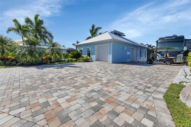 view of property exterior with a garage