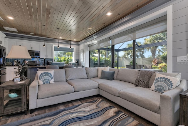 living room with dark wood-type flooring and wooden ceiling