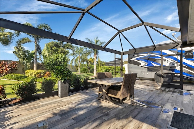 wooden deck featuring a lanai