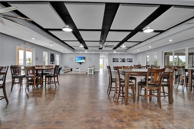 dining room featuring beam ceiling, hardwood / wood-style flooring, french doors, and coffered ceiling