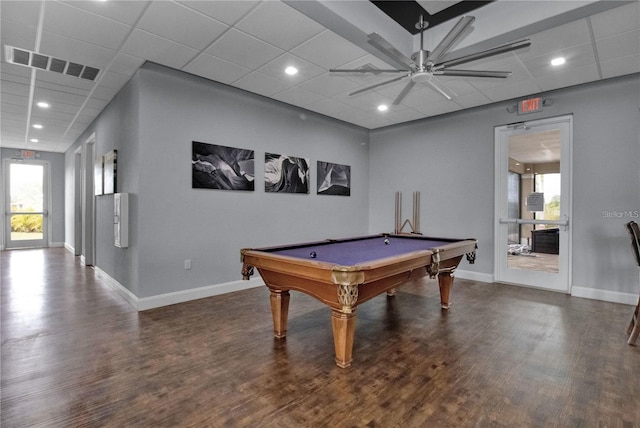 recreation room with a wealth of natural light, ceiling fan, and dark hardwood / wood-style floors