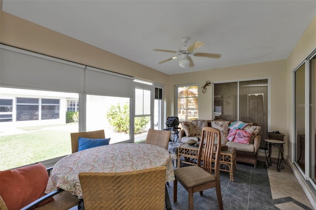 sunroom / solarium with ceiling fan