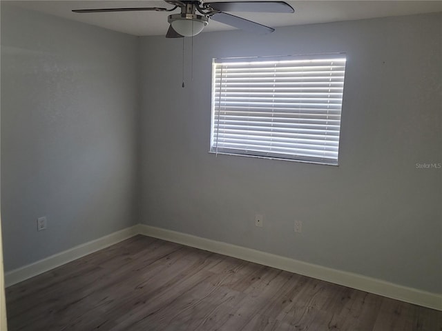 unfurnished room featuring ceiling fan and hardwood / wood-style floors