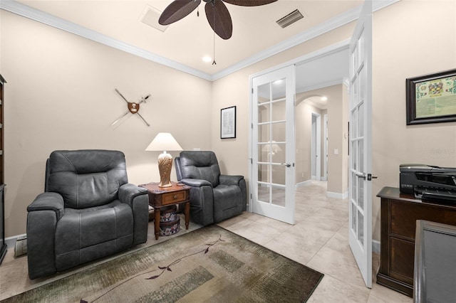 living area featuring french doors, light tile patterned floors, ceiling fan, and crown molding