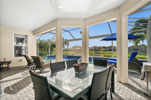 view of patio / terrace with glass enclosure