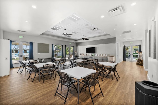 dining space featuring ceiling fan, a wealth of natural light, and french doors