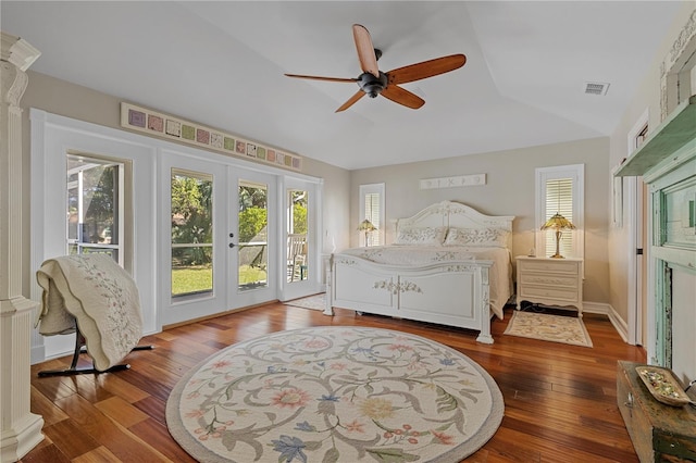 bedroom featuring ceiling fan, french doors, wood-type flooring, vaulted ceiling, and access to outside