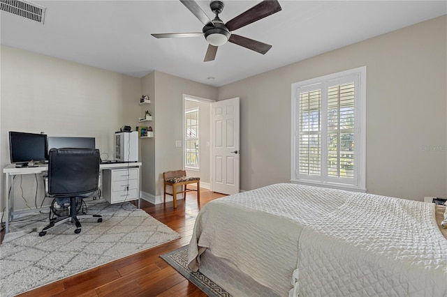 bedroom featuring ceiling fan and hardwood / wood-style floors