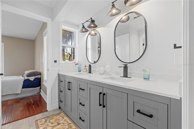 bathroom featuring vanity and hardwood / wood-style flooring