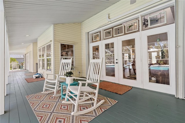 wooden terrace featuring french doors