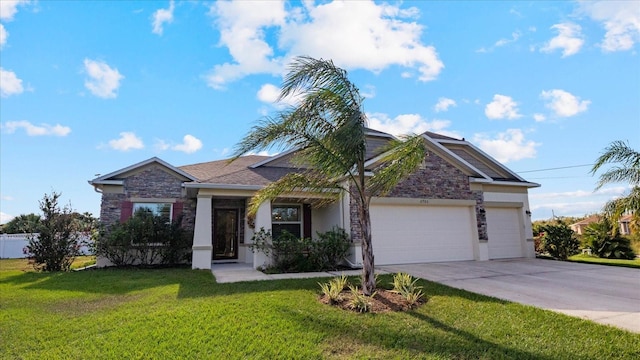 view of front facade featuring a garage and a front yard