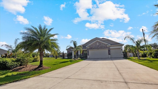 view of front facade featuring a garage and a front lawn