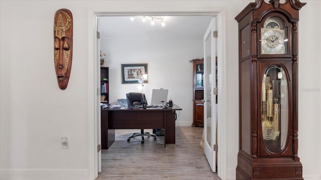 home office featuring light hardwood / wood-style flooring