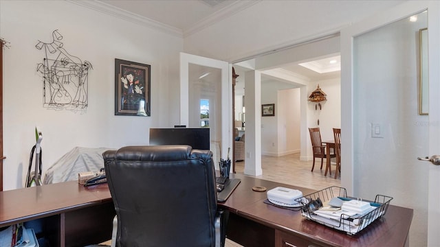 office area featuring hardwood / wood-style flooring and crown molding