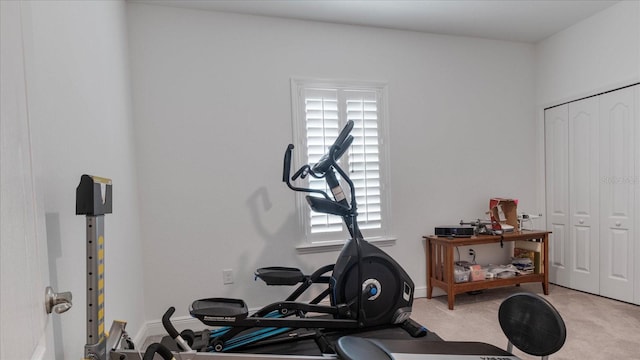 workout area with light colored carpet