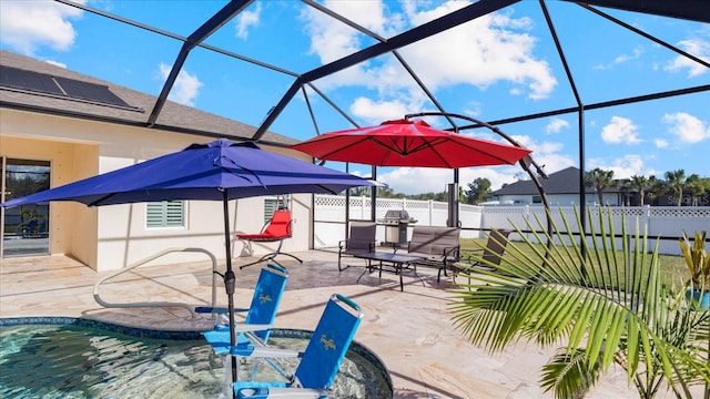 view of patio / terrace with a fenced in pool, glass enclosure, and grilling area