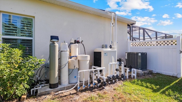 view of side of property featuring cooling unit