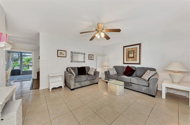 living room with light tile patterned floors and ceiling fan