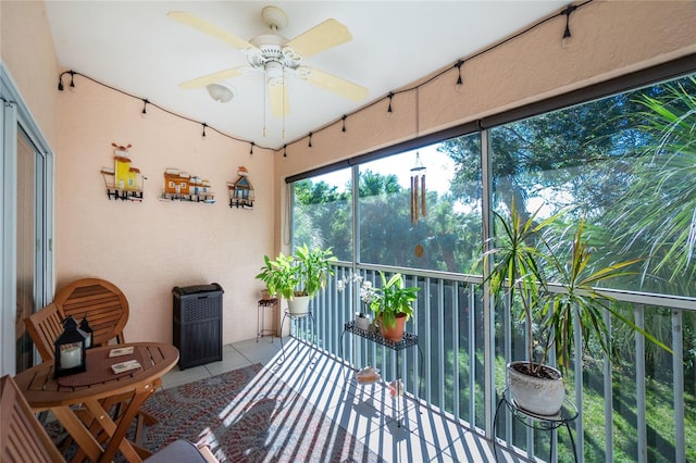 sunroom / solarium with ceiling fan