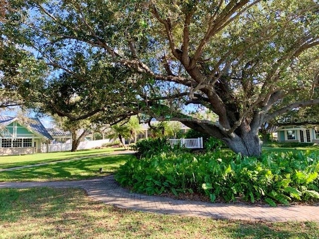 view of home's community featuring a yard