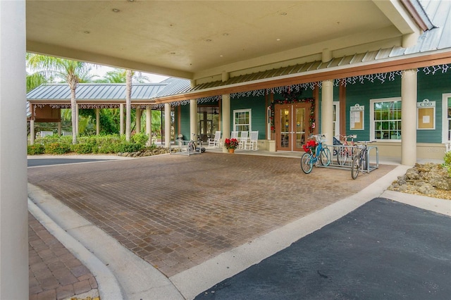 view of patio featuring french doors and covered porch