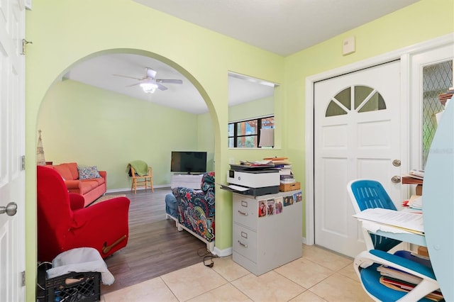 entryway featuring ceiling fan and light wood-type flooring