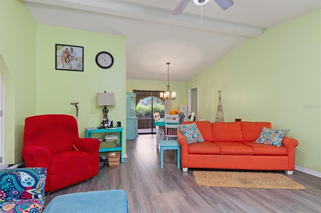 living room with hardwood / wood-style floors, lofted ceiling with beams, and ceiling fan with notable chandelier