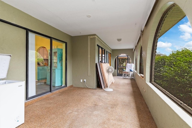 view of unfurnished sunroom