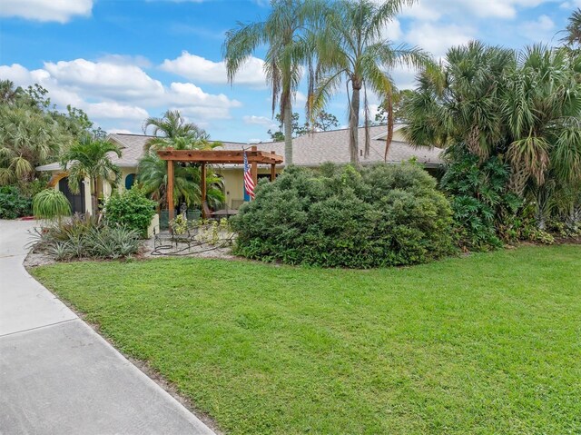 view of yard with a pergola