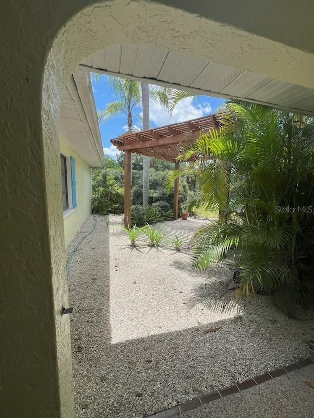 4290 Randypaar St, Port Charlotte, FL 33948 - view of yard with a pergola and a patio